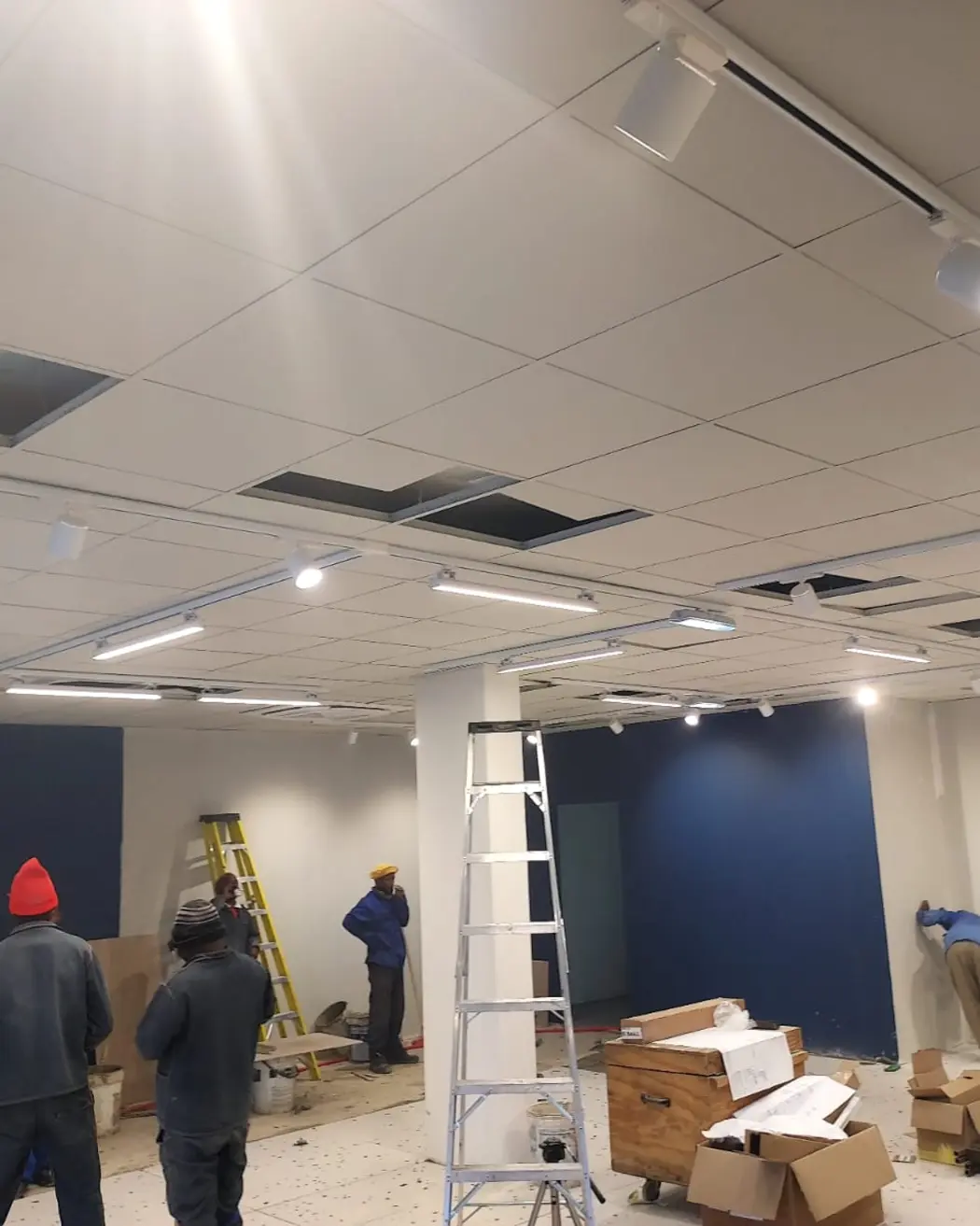 The Geddes Electrics team on site during a shop fit-out